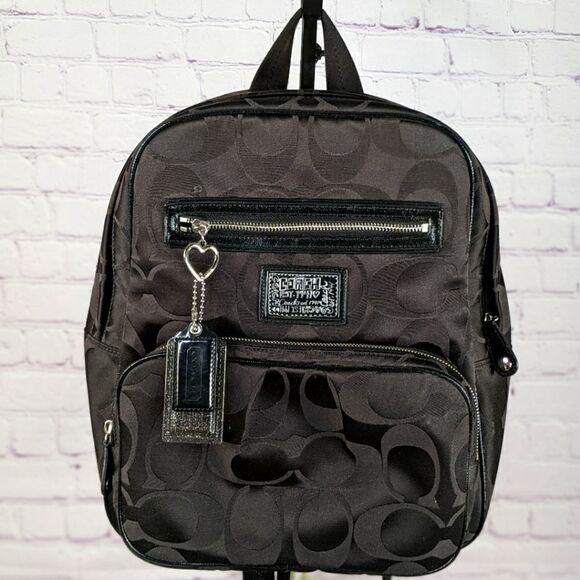 Coach Signature Daisy Poppy Backpack - Picture 1 of 13